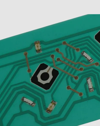 Populated flexible circuit with a push-button switch, conductive tracks and electronic components