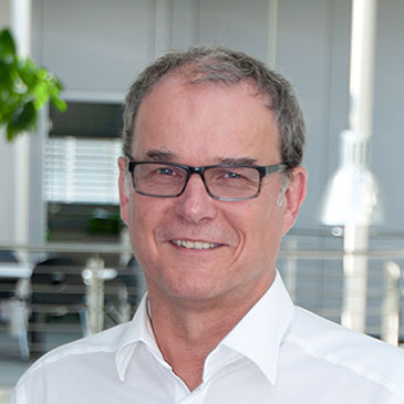 Portrait photo of the CEO of Hoffmann + Krippner