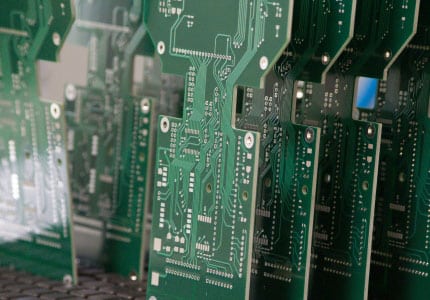 Printed circuit boards lined up