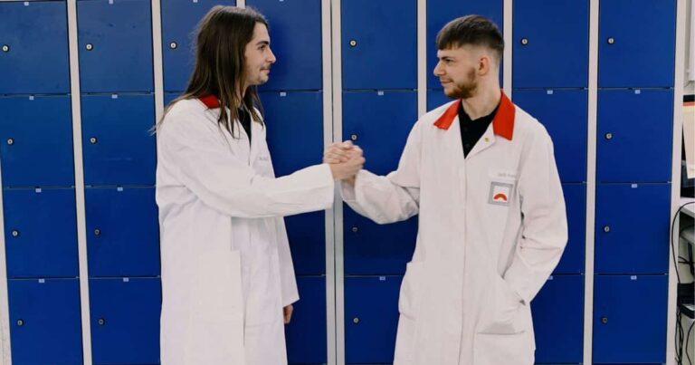 Two boys high-five each other