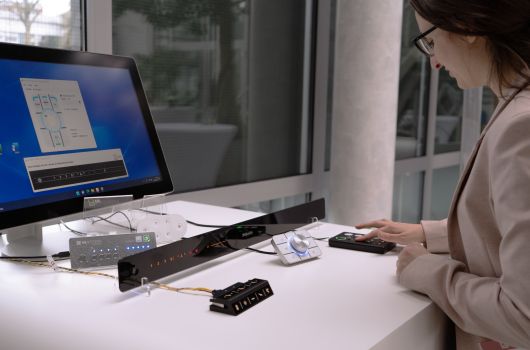 Woman operates membrane keypad