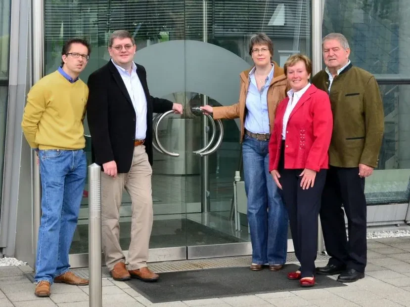 The Krippner family in front of the main entrance