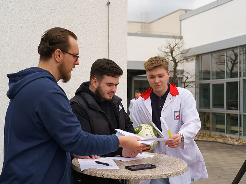 Apprentices evaluate goal wall shooting