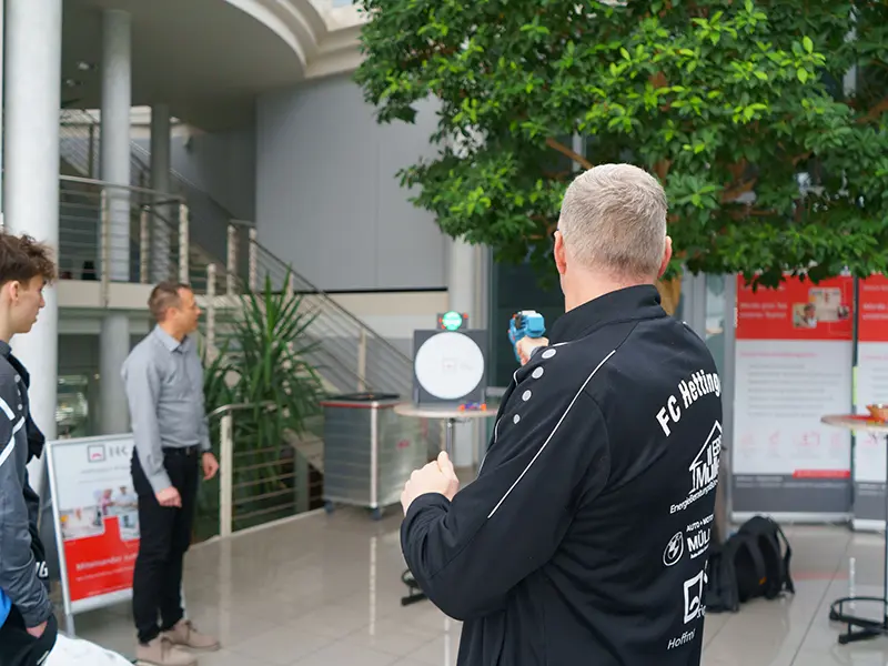 Man aims at dartboard