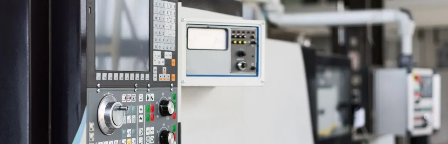 Hybrid HMIs with touchscreen and buttons on a CNC machine